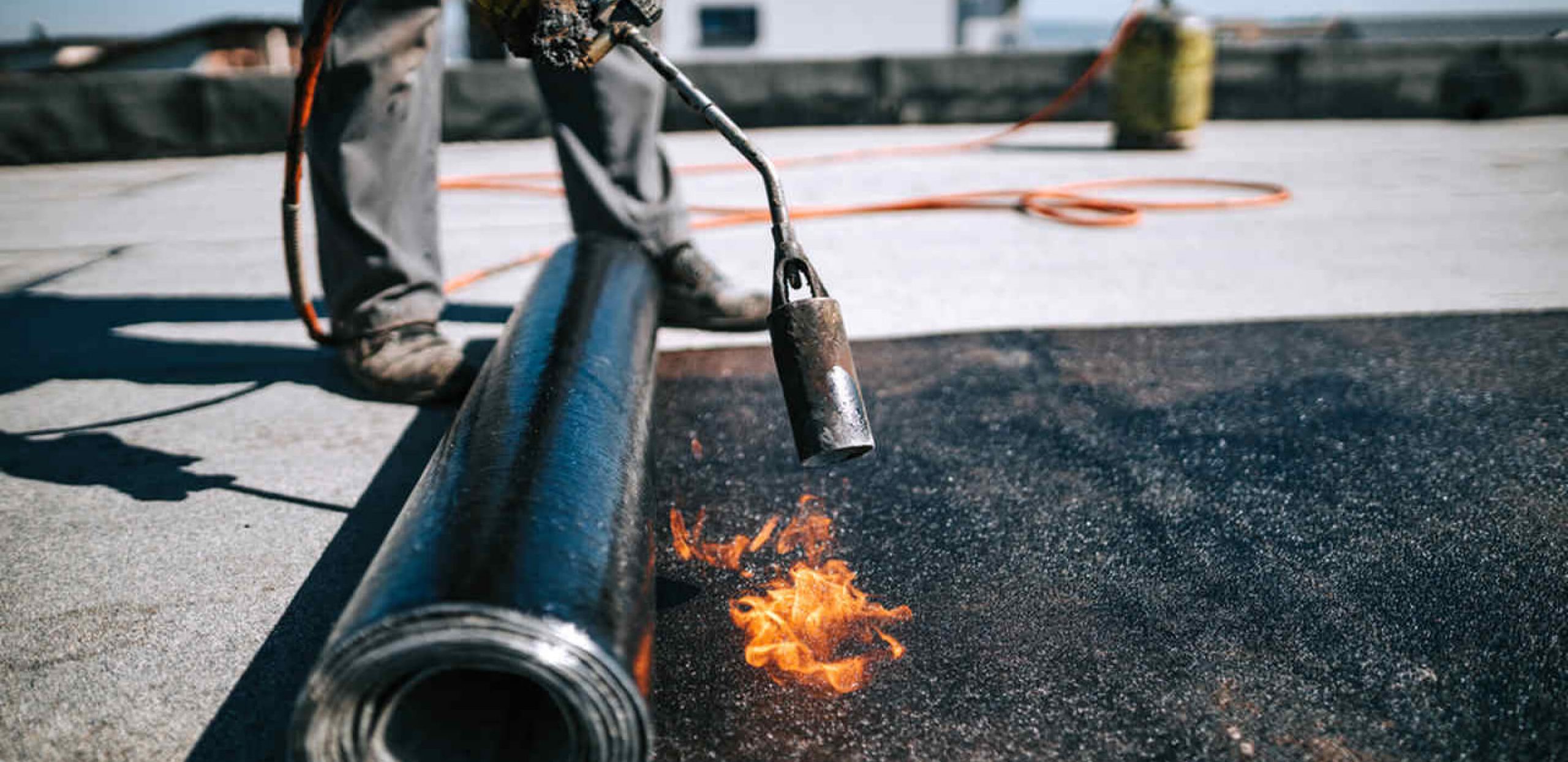 POLYMER-MODIFIED BITUMEN